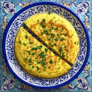 Egg Tortilla filled with fluffy eggs cheese and vegetables